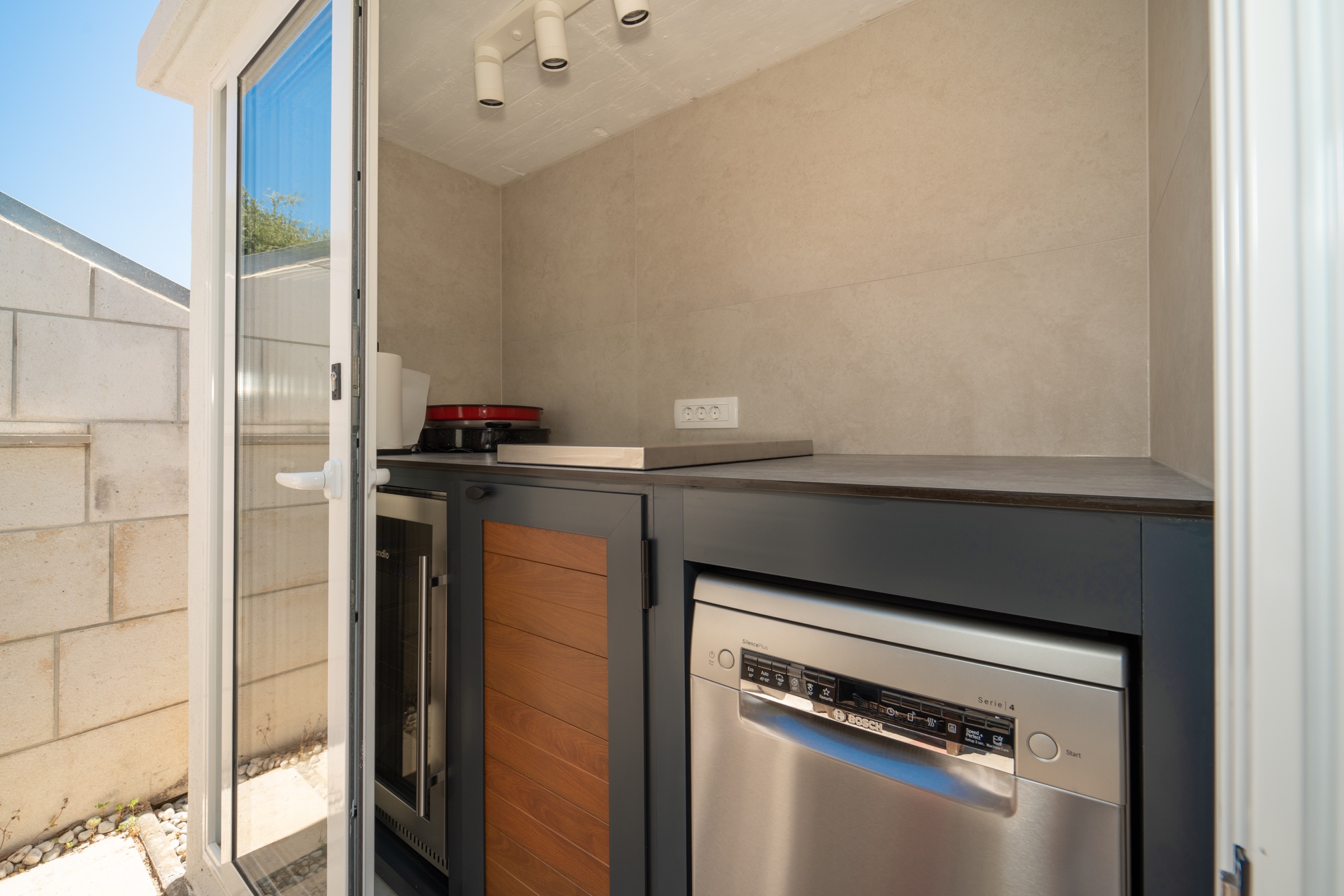 Villa Lostura’s true outdoor preparation kitchen beside the pool and grill area