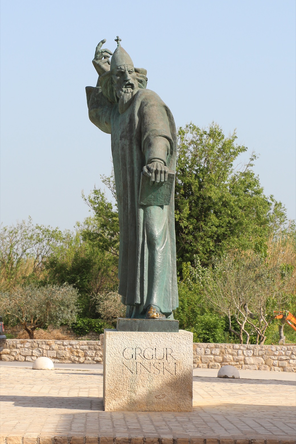 The full statue of Grgur Ninski in Nin, with the polished big toe visitors touch when making a wish